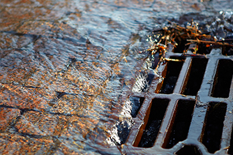 Storm Drain in the road filling with water