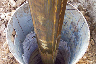 Russell Reid Drill Cutting a hole in the ground