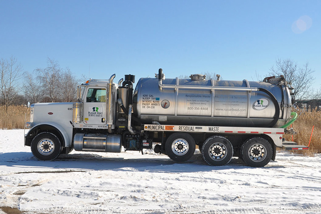 Russell Reid Vac Truck in a parking lot